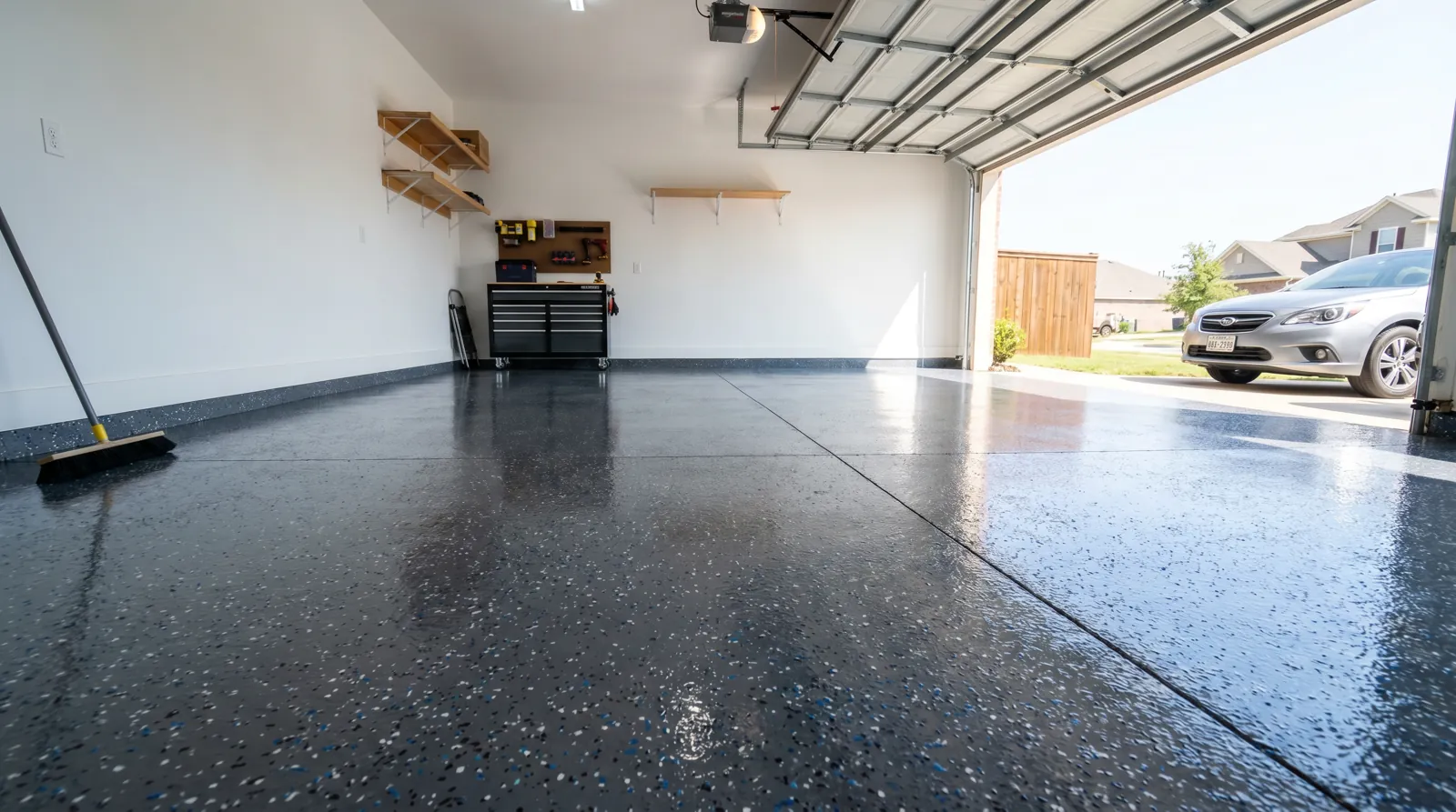 Garage floor after epoxy coating - glossy charcoal finish